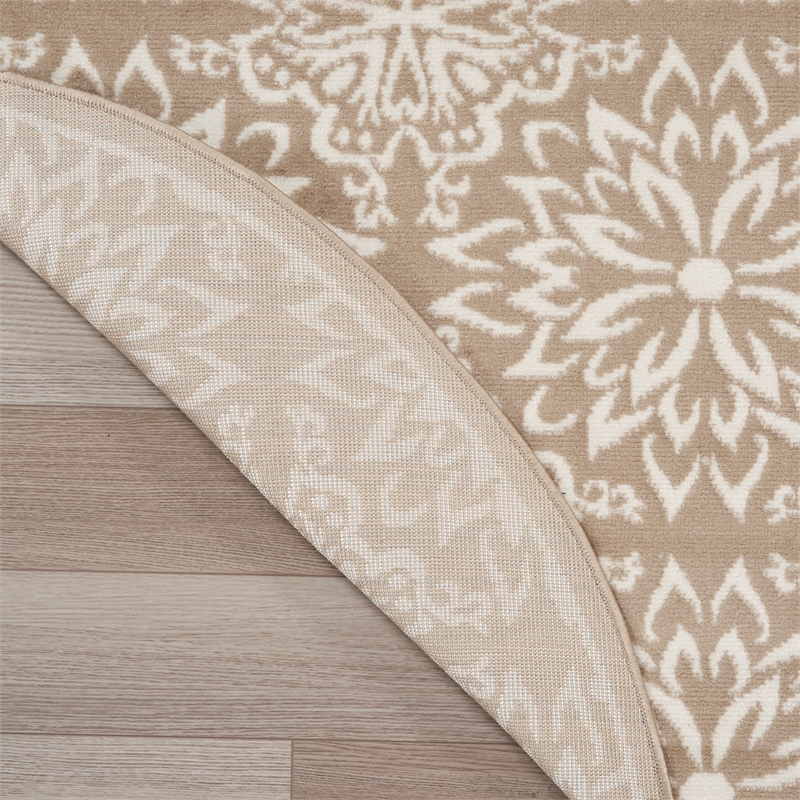 nourison home jubilant 5' x round taupe   area rug