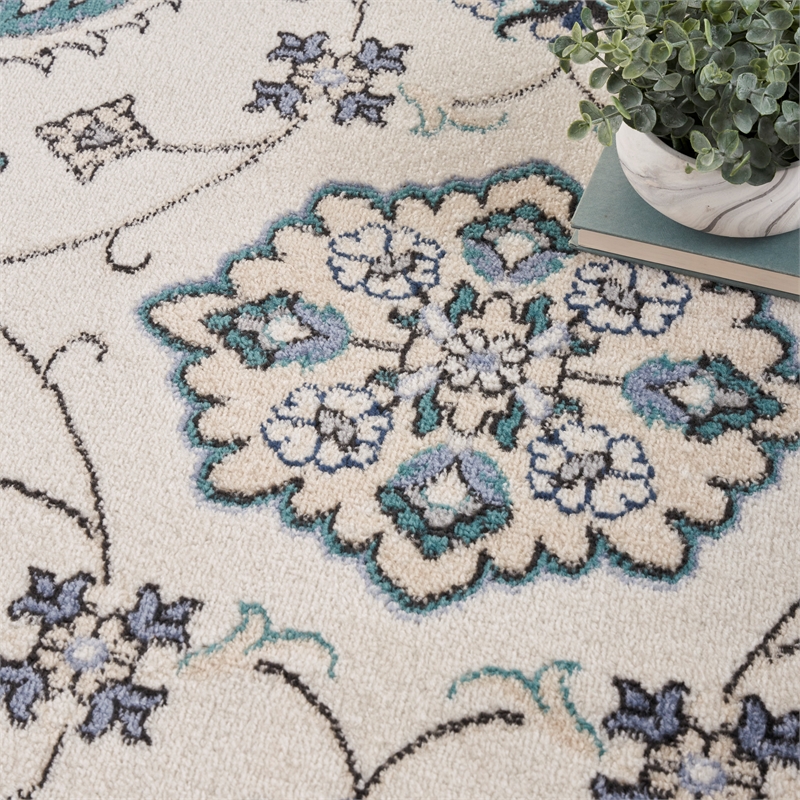 Nourison Essentials 8' x Round Ivory Blue Fabric Area Rug