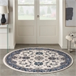 Nourison Essentials 8' x Round Ivory Blue Fabric Area Rug