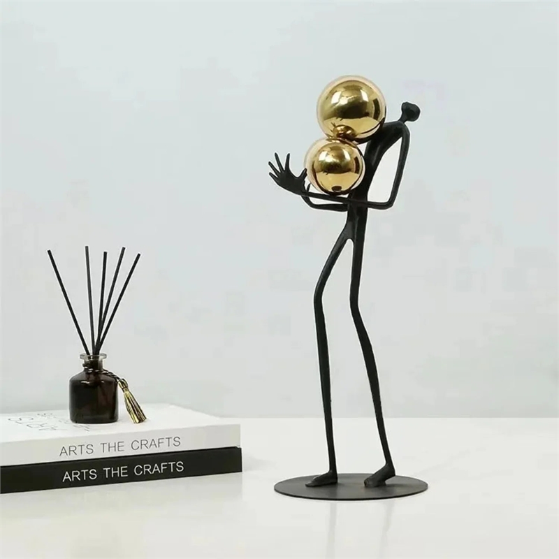 Human Sculpture with Decorative Metal Balls