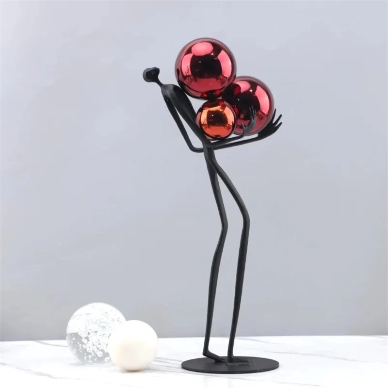 Human Sculpture with Decorative Metal Balls