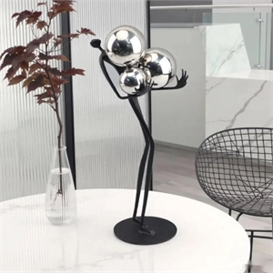 Human Sculpture with Decorative Metal Balls