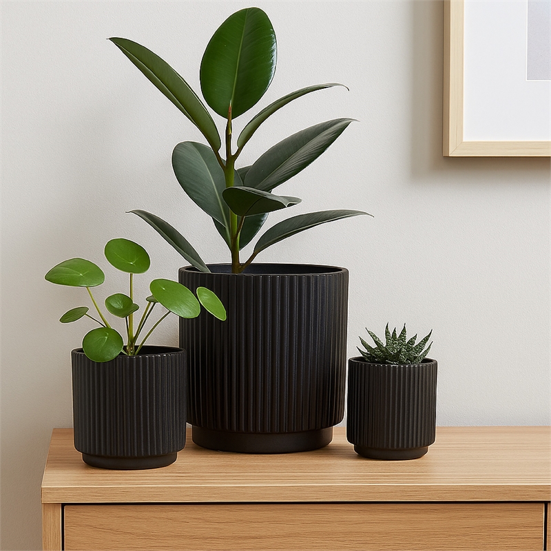 Benjara Elly Round Planter Set of 3- Ribbed Texture Black Resin- 16-12-9 Inch