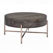 Benjara 1 Drawer Round Modern Coffee Table with Crossed Metal Legs- Brown & Gold
