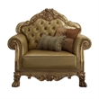 Benjara Traditional Button Tufted Leatherette Chair with Carved Details- Gold