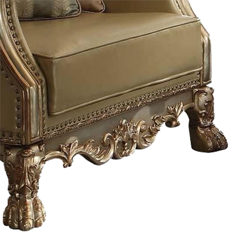 Benjara Traditional Button Tufted Leatherette Chair with Carved Details- Gold