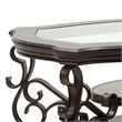 Benjara Cocktail Table with Glass Top and Scroll Accent- Brown